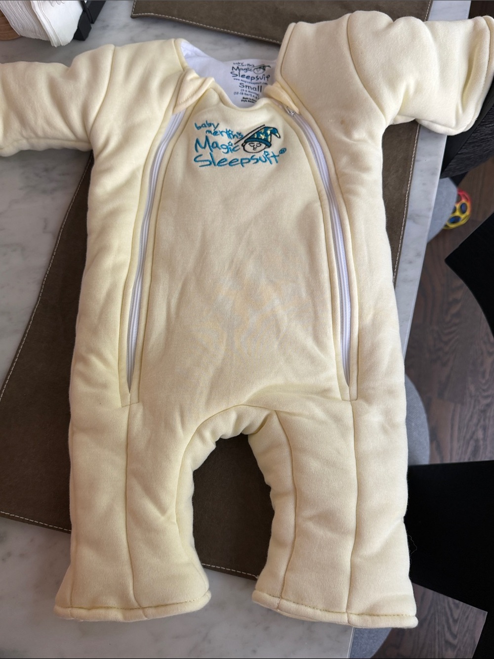 Baby Merlin's Magic Sleepsuit in Pale Yellow - Infant Footed One-Piece